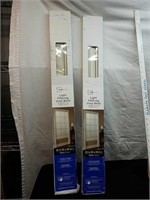 Pair of new light filtering vinyl blinds 32 x 64