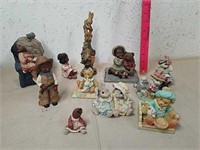 Group of collectible figurines includes cherished