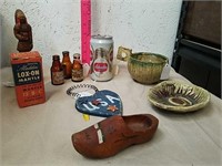Vintage items includes Aladdin mantle, beer can,
