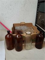 Vintage Clorox brown bottles with vintage milk