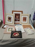 Group of framed artwork
