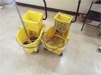 Two Janitorial Mop Buckets with Mops