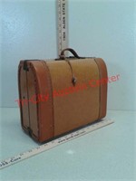 Small travel suitcase with lock and key