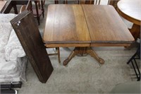 Eastlake extension table and 4 leaves.  Table 48"