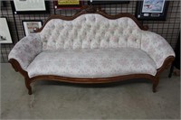 Carved settee.  Upholstery worn.  73"