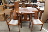 Cherry dining table and 6 chairs.  46" x 54".  3-