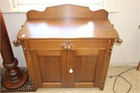 Early carved wash stand with towel bars.  34"