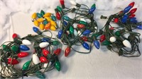 Three strands of exterior vintage Christmas bulbs