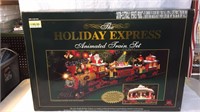Holiday express animated train set includes four