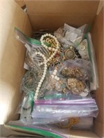 box of necklaces and more