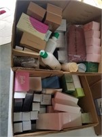 2 boxes of Avon products