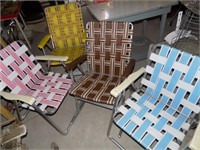 4 Plastic Lawn Chairs - One Rocking
