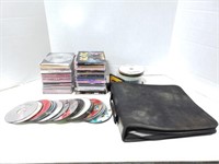 Large lot of cds and cd book