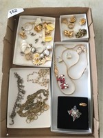 Necklaces; clip on ear rings; brooches