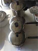 Three (3) pots; Four (4) lids