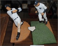 rivera and jeter yankee figures on stands