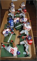 11  new york giants figures on stands