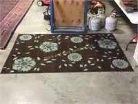 8ft by 11ft floor rug with floral design