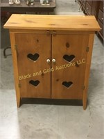 32" tall wooden cupboard with hearts cutout