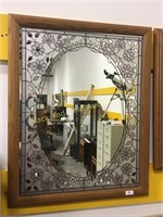 31” by 25” framed mirror with flower design