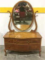 6ft tall dresser with an oval mirror