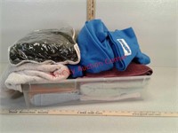 Storage tote of towels and 2  snuggies