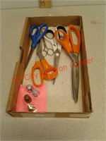 Sewing scissors and thimbles