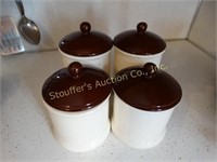 4 PC canisters set 2 @ 8" & 2 @ 7" w/ contents
