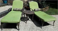 Two Wrought Iron Chaise Lounges and Side Table