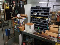 Workbench, file cabinet, parts bin, pegboard with