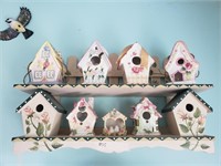 Wooden shelf and bird houses.