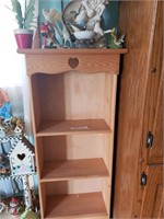Wooden shelf and contents.