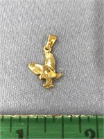 Small gold tone eagle pendent, approx. 1/2" long