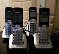 Four V-Tech Cordless Phones