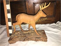 Handcarved white tail deer