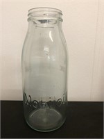Genuine Mobiloil embossed oil bottle