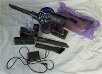 Dyson vacuum with attachments. Some attachments