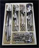 Tray of mismatched stainless flatware.  Some