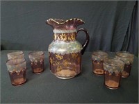 Amethyst glass pitcher and 6 glasses