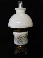 Milk glass oil lamp with metal base