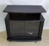 Black TV Stand on wheels.  Excellent condition.