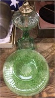 Green glass oil lamp, & 6 green glass plates, 8