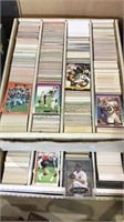 2 boxes , 8 rows of sports cards, mostly football