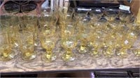 Set of 30 amber gold glass stemware, 8 each in 3