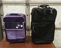 (2) suitcases