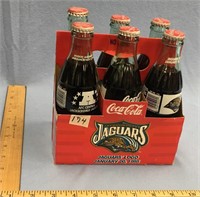 6 Pack of Coca Cola bottles  1995 Jaguar logo