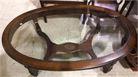 Nice oval low side coffee table with glass top