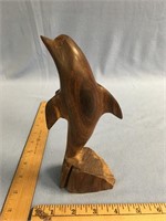 Wood carving 8" tall of jumping dolphin        (g