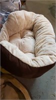 Pet bed. Extremely soft interior.  Very Small