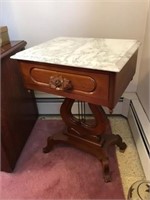2 Marble top tables with harp base